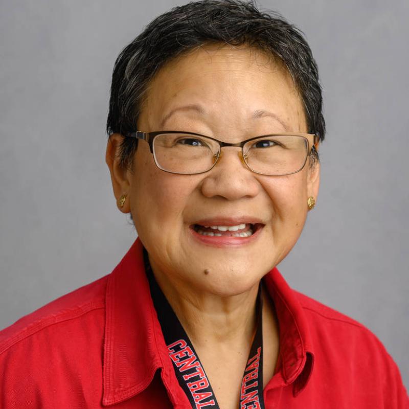 Sandra Gong in a red button down shirt 