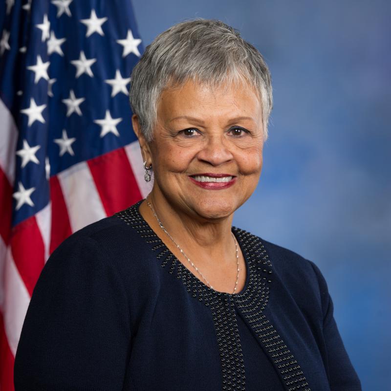 Congresswoman Bonnie Watson Coleman posed in front of the American flag