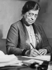 Image of woman sitting at desk 