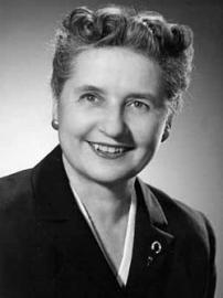 Mildred Barry Hughes smiles in black and white portrait