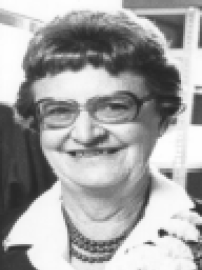 Ruth Carpenter smiles wearing large corsage